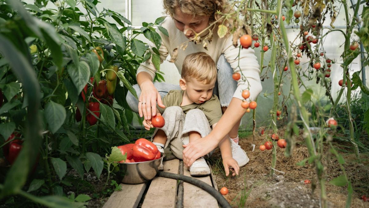 image of mother and son gardening